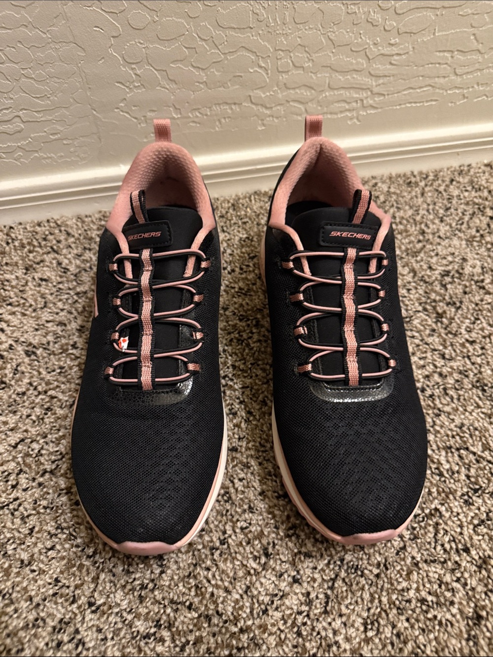 Skechers Women's Black with Pink Trim Athletic Sneakers